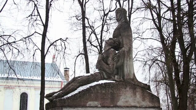 Sculptor Robertas Antinis Monument in Sirvintos, Lithuania. Mother holding her dying son - defender of Independence.