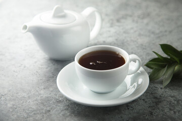 Freshly made black tea in a white cup