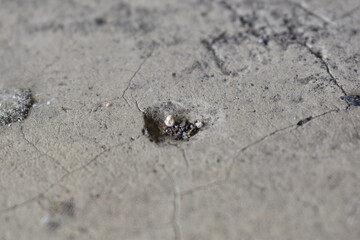 Cracks and holes on a concrete floor