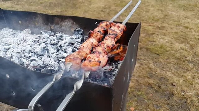 BBQ in slow motion, baking some meat (shashlik, grilled mutton) in 60fps