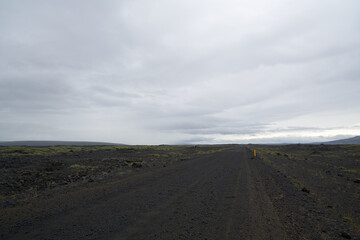 Vulcanic landscape in the highlands of iceland, black ash deserts with green moss