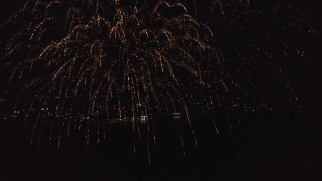Reverse HD drone fireworks video clip.