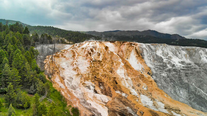 Drone aerial view of Canary Spring and terraces in the Mammoth Hot Spring area of Yellowstone National Park