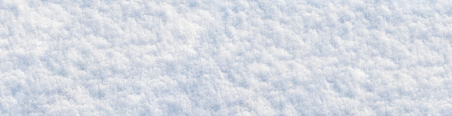 Snow texture on a sunny day, winter background
