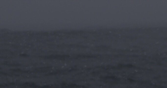 Slow motion imagery of crossing the Drake Passage to Antarctica in a storm. A dramatic scene with heavy wind and big waves. Shot in 4k with RED Epic Dragon.
