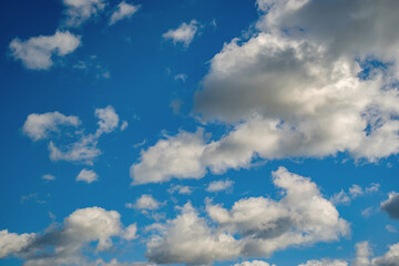 Blue sky background with a tiny clouds