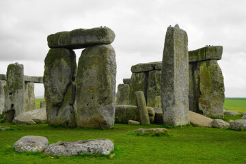 Fototapeta premium Stonehenge stones up close with green grass