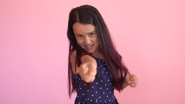 little girl pulling an invisible rope
