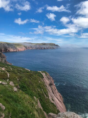 view of ocean from the top of a rocky cliff