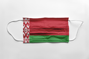 Face mask with Belarus flag printed, on white background, isolated