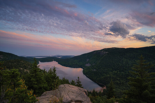 Colorful clouds over Jordan Pond overlook from North Bubble in Acadia National Park