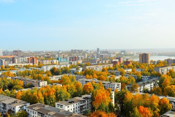 City view with Soviet architecture and golden trees in autumn