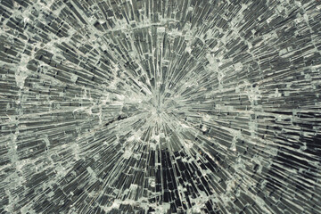 Closeup of shattered glass window