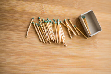 Box of matches on wooden background close up