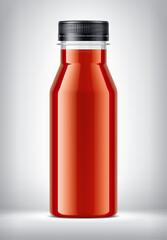Plastic Bottle on background with Tomato Juice. 