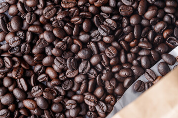 roasted coffee beans on dark stone.copy space