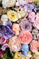 Vintage Day of Dead layout with sugar skulls and colorful flowers. Minimal Halloween concept. Flat lay.