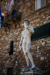 The Italian Renaissance sculpture of The David created in marble by the Italian artist Michelangelo...