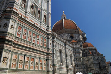 Fototapeta na wymiar Side view of Duomo in Florence with Campanile and the Brunelleschi dome