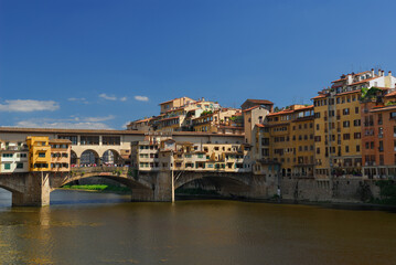 Fototapeta na wymiar Ponte Vecchio old bridge shops over the Arno river in Florence