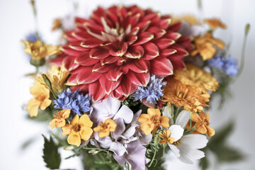 bouquet of autumn flowers with red Dahlia in vintage style