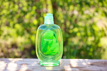 Green Plastic Bottle for Shampoo, Liquid Soap or Lotion.