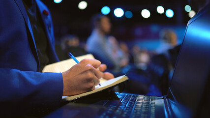 Crowd student study forum business man audience college. Education auditorium person write note....