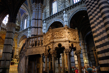 Octagonal carousel pulpit in the Duomo dell Assunta in Siena Italy