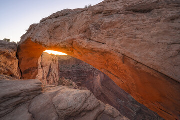 Angled view of Mesa Arch in Canyonlands National Park at sunrise
