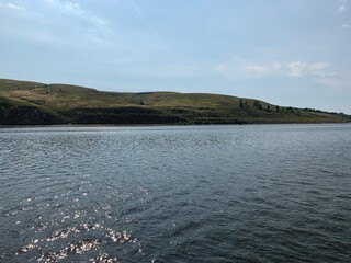 Green hills on the river