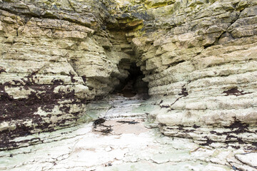 Coastal sea cave at low tide