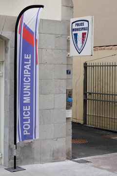 police municipale means in french Municipal police sign and logo on entrance and flag