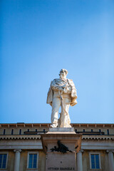 Fototapeta premium The monument of Vittorio Emanuele II in Bergamo, Lombardy, Italy. The statue is made of white marble in the Lower City (Città Bassa) in front of the city hall. European architecture.
