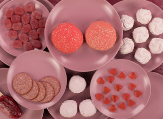 food on plates isolated on red background