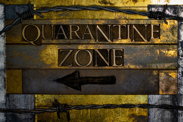 Quarantine Zone text with barbed wire formed with real authentic typeset letters on vintage textured silver grunge copper and gold background