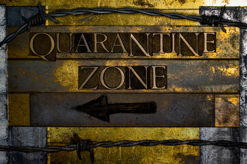 Quarantine Zone text with barbed wire formed with real authentic typeset letters on vintage...
