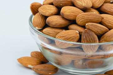 Almond nuts isolated on white background, Selective focus. Is a healthy food Rich in vitamins Fiber and Antioxidants.