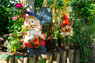 Cheerful garden gnomes with inscription WELCOME. 24 September 2020, Minsk Belarus