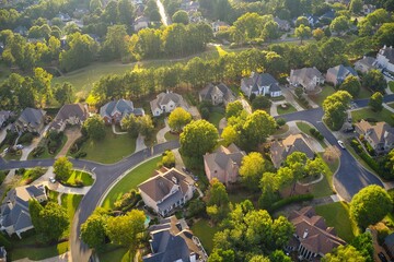 Aerial view of an upscale subdivision in suburbs of a city in USA - obrazy, fototapety, plakaty