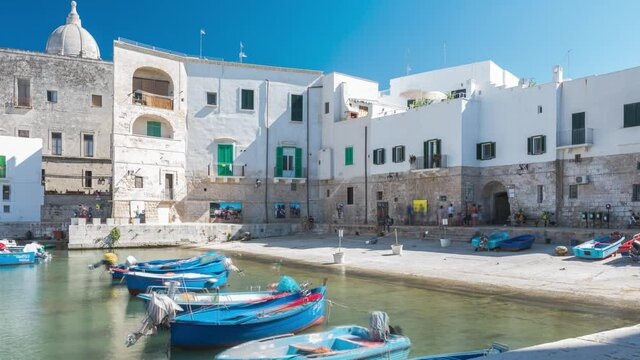 Timelapse 4k, Monopoli province of Bari in Puglia south of Italy. Tourists walk in the historic center of the city