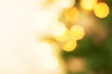 Obraz premium Yellow bokeh lights. Christmas defocused background