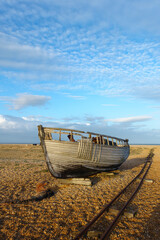 Wreckage of an old boat on the beach at Dungeness in Kent