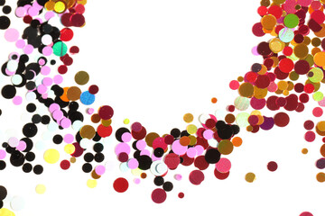 Many multicolored metallic circles forming a texture for the background.