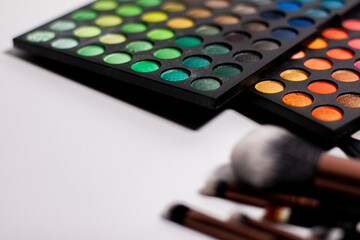 Sets of shadows and brushes for cosmetics and makeup. 