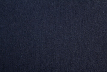 Pattern with grey knitted wool fabric for clothing design. Colorful abstract seamless pattern. Gray background.