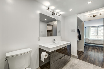Beautiful empty renovated apartment in an apartment building with bathroom, new kitchen, new floors, all white painted

