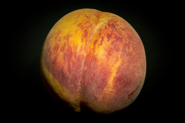 Ready juisy peach with dark background.