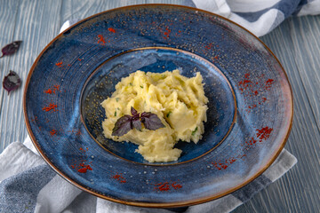 Mashed potatoes with olive oil. Natural delicious food. Greek cuisine menu. Still life in a marine...