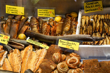 Assorted scandinavian smoked fishes and delicacies at counter