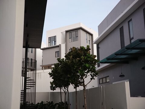 View of neighbourhood of geometric minimalistic modernism houses in a residential district in Kuala Lumpur